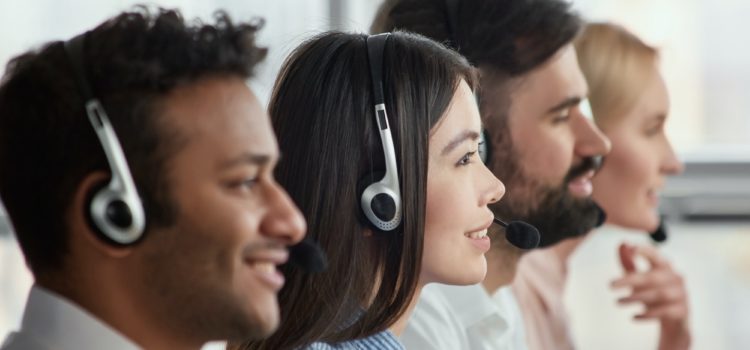 Side view asian woman with headset attentively looking.